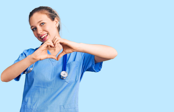 Nurse doing heart symbol